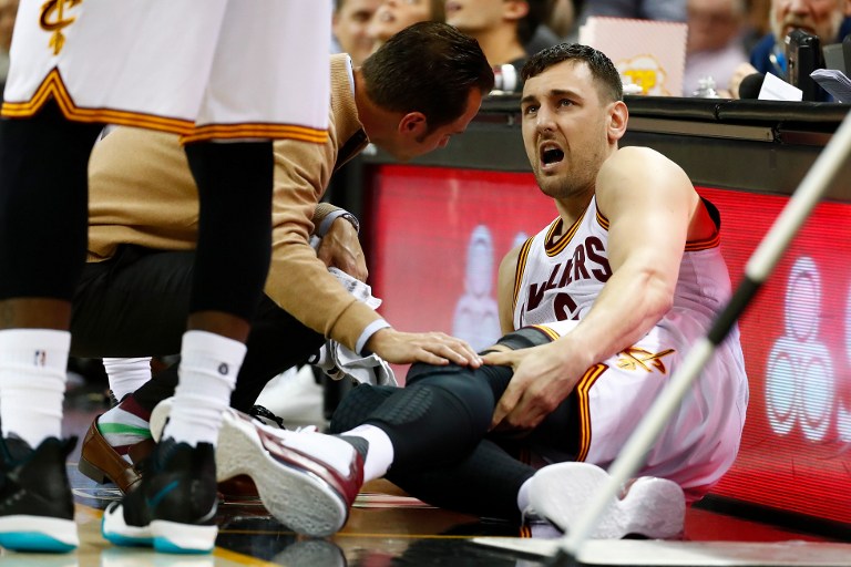 CLEVELAND, OH - MARCH 06: Andrew Bogut #6 of the Cleveland Cavaliers reacts after getting hurt in the first half while playing the Miami Heat at Quicken Loans Arena on March 6, 2017 in Cleveland, Ohio. NOTE TO USER: User expressly acknowledges and agrees that, by downloading and or using this photograph, User is consenting to the terms and conditions of the Getty Images License Agreement.   Gregory Shamus/Getty Images/AFP