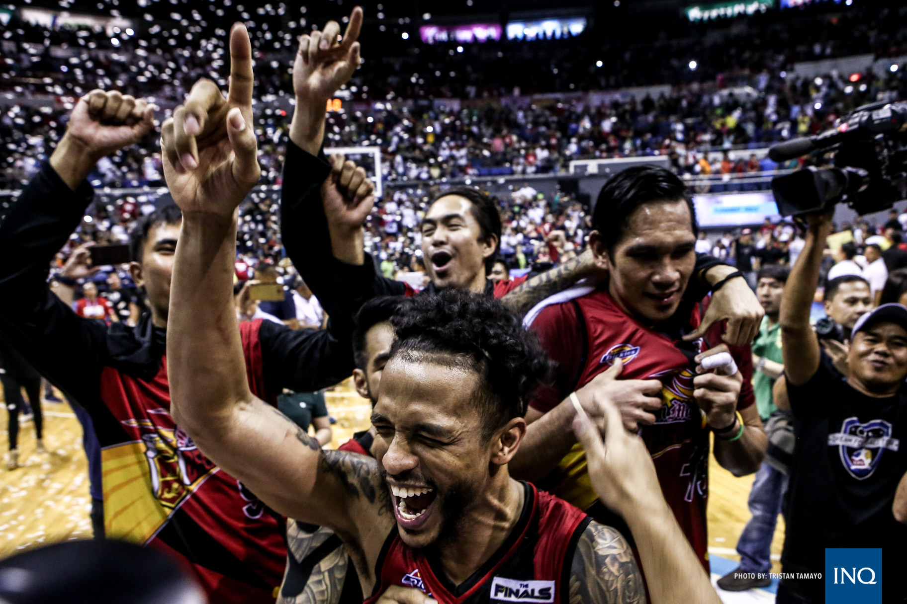 San Miguel Beermen celebrate after winning their third straight PBA Philippine Cup championship. Tristan Tamayo/INQUIRER.net