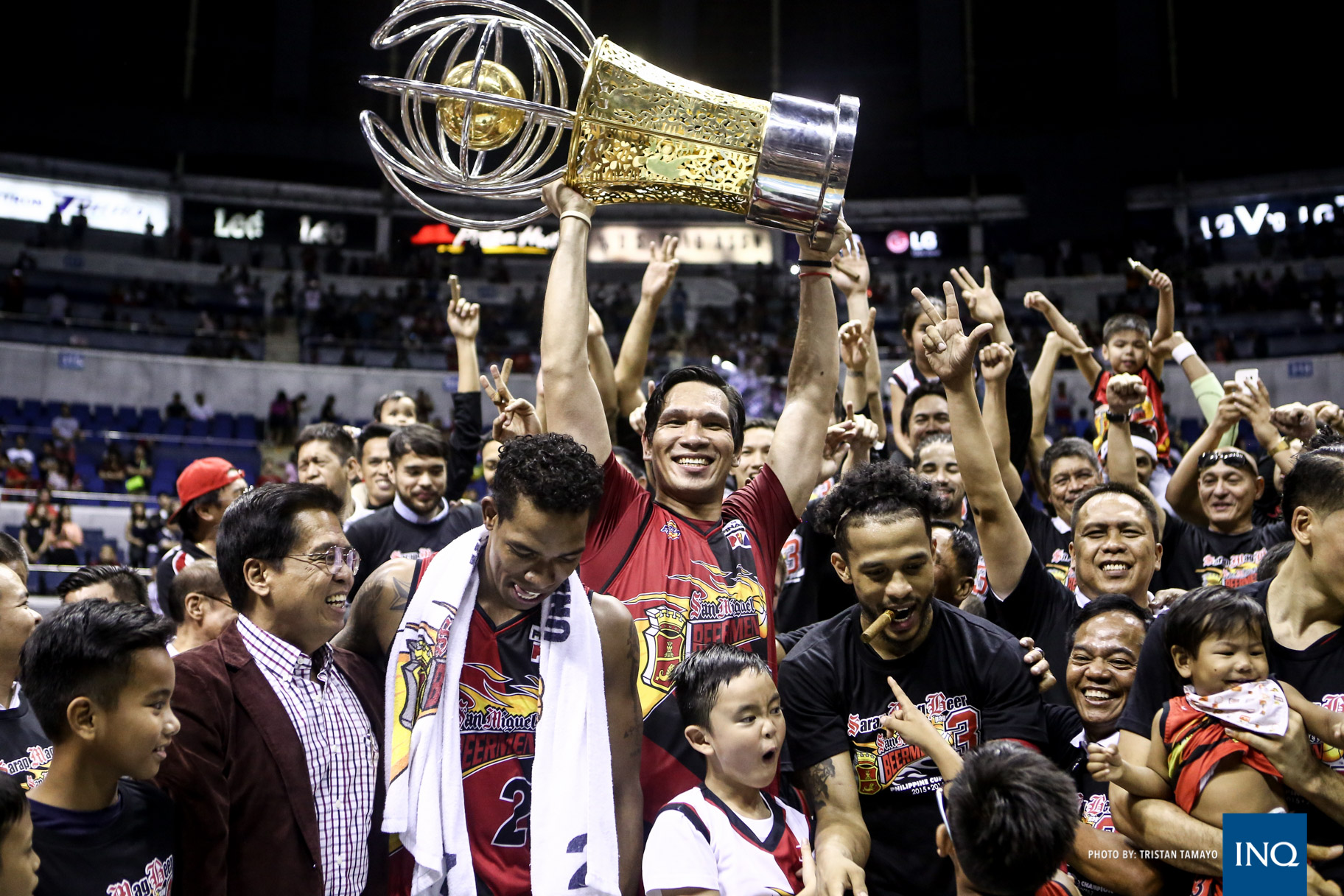 San Miguel Beer center June Mar Fajardo lifts the Perpetual Trophy after the Beermen beat the Barangay Ginebra Gin Kings in Game 5 of the 2017 PBA Philippine Cup Finals on Sunday, March 5, 2017, at Smart Araneta Coliseum. Tristan Tamayo/INQUIRER.net