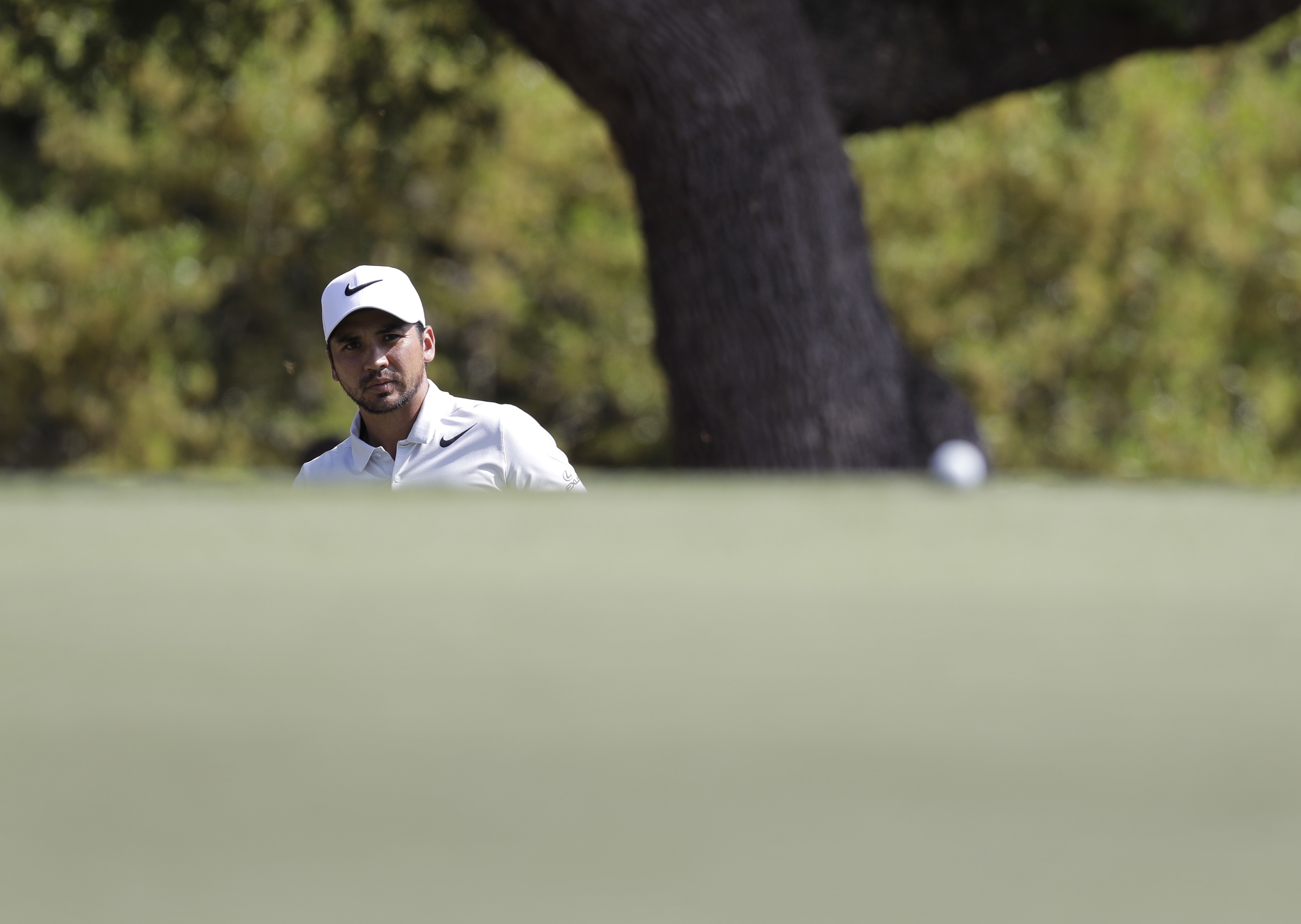 Defending champion Jason Day, of Australia, watches his putt on the sixth hole during round-robin play at the Dell Technologies Match Play golf tournament at Austin County Club, Wednesday, March 22, 2017, in Austin, Texas. Day conceded to Pat Perez after the hole and withdrew from the tournament. (AP Photo/Eric Gay)