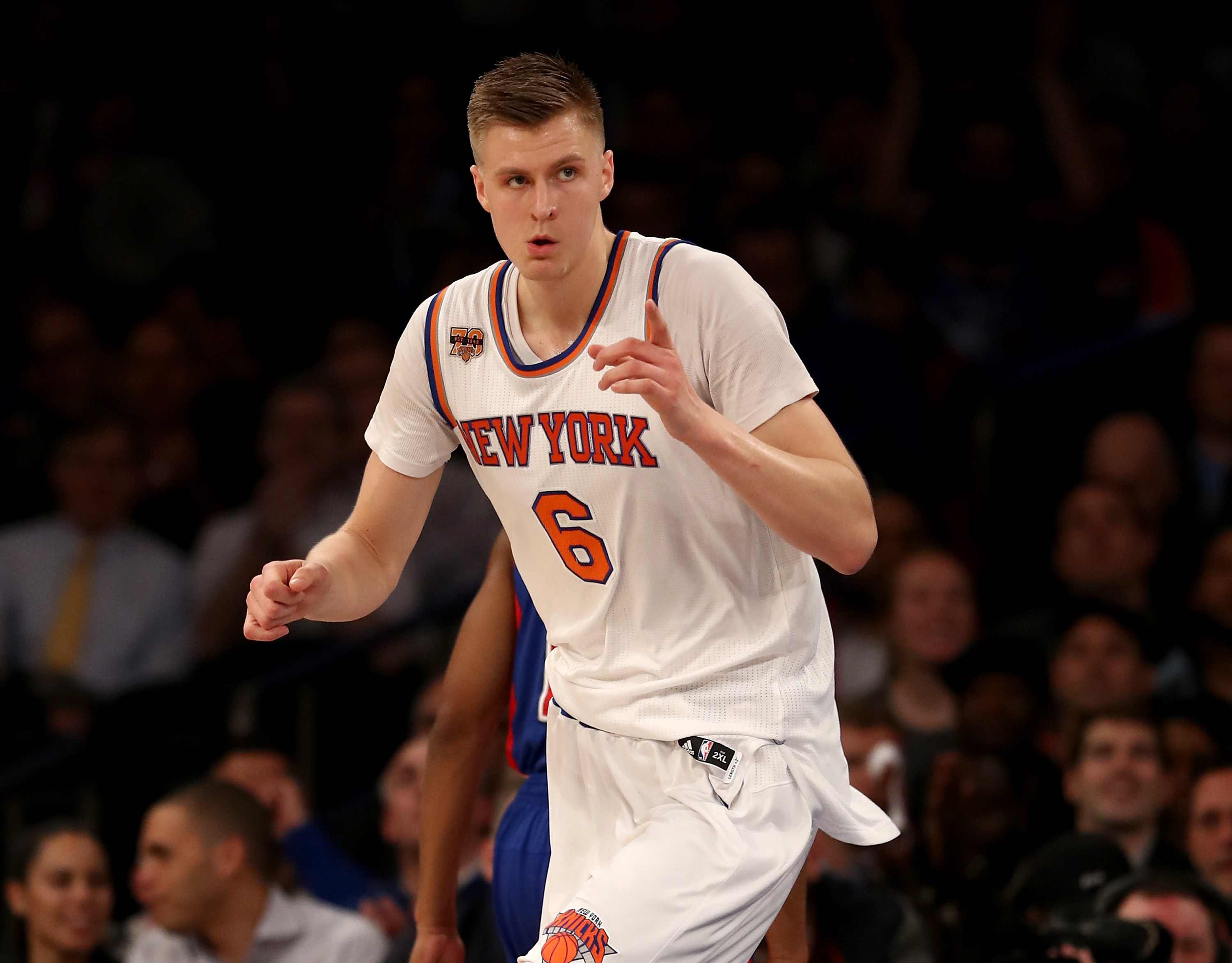 Kristaps Porzingis #6 of the New York Knicks celebrates his basket in the first quarter against the Detroit Pistons at Madison Square Garden on March 27, 2017 in New York City. NOTE TO USER: User expressly acknowledges and agrees that, by downloading and or using this Photograph, user is consenting to the terms and conditions of the Getty Images License Agreement   Elsa/Getty Images/AFP