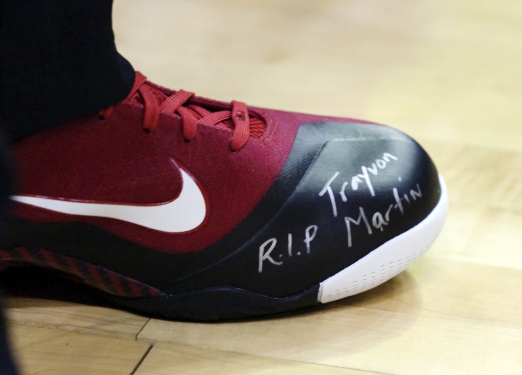 Miami Heat forward LeBron James wears a message honoring Trayvon Martin on his shoe before their NBA basketball game against the Detroit Pistons on March 23. (Duane Burleson/AP)