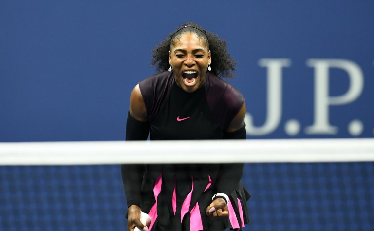 (FILES) This file photo taken on September 8, 2016 shows Serena Williams of the US reacting after winning a point against Karolina Pliskova of Czech Republic during their 2016 US Open Womens Singles semifinal match at the USTA Billie Jean King National Tennis Center in New York. Tennis great Serena Williams hinted April 19, 2017 that she's expecting her first child, posting a photo of herself on Snapchat captioned "20 weeks". The photo, captured by US media, shows Williams in a yellow swimsuit with what appears to be a baby bump.Williams, 35, hasn't played since beating her sister Venus in the final of the Australian Open in January to clinch a record 23rd Grand Slam singles title. / AFP PHOTO / Don EMMERT