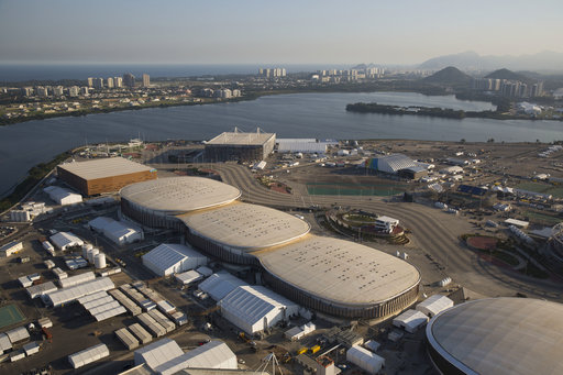 File - In this July 4, 2016 file photo, the Olympic Park of the 2016 Olympics is seen from the air, in Rio de Janeiro, Brazil. Rio de Janeiro's former Mayor Eduardo Paes is one of dozens of top politicians implicated in a sweeping government corruption investigation in which construction giant Odebrecht paid bribes to help win contracts. Obebrecht was involved in building numerous Olympic-related projects, including several arenas and media venues at the Olympic Park, a subway-line extension, and the renovation of Rio's port area. (AP Photo/Felipe Dana, File)