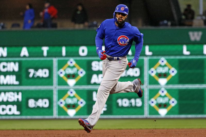 Chicago Cubs' Jason Heyward rounds second base after hitting a three-run home run off Pittsburgh Pirates starting pitcher Chad Kuhl in the first inning of a baseball game in Pittsburgh, Monday, April 24, 2017. (AP Photo/Gene J. Puskar)