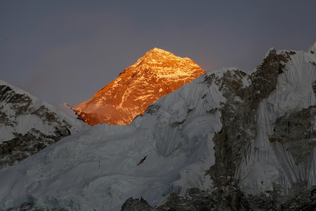 FILE - In this Nov. 12, 2015, file photo, Mt. Everest is seen from the way to Kalapatthar in Nepal. An American climber has died near the summit of Mount Everest and an Indian climber is missing after heading down from the mountain following a successful ascent, expedition organizers said Sunday. (AP Photo/Tashi Sherpa, File)