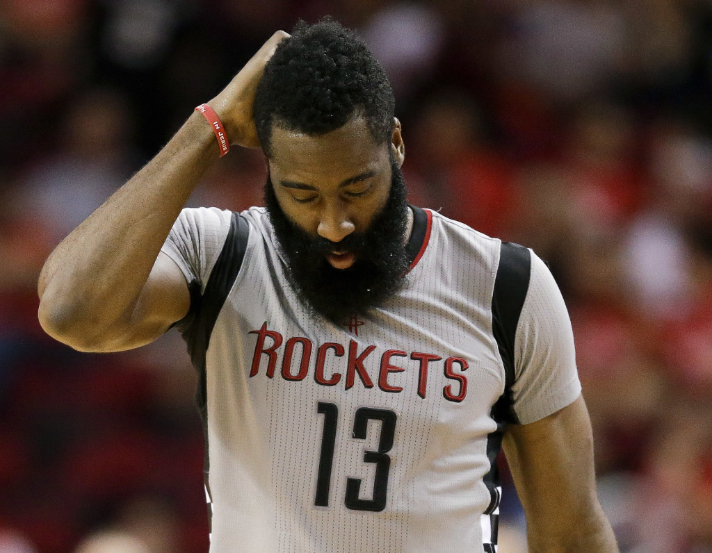 Houston Rockets guard James Harden walks the court late in the fourth quarter in Game 6 of an NBA basketball second-round playoff series against the San Antonio Spurs, Thursday, May 11, 2017, in Houston. San Antonio won 114-75. (AP Photo/Eric Christian Smith)