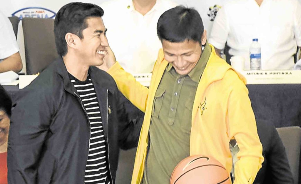 All’s well between coaches Aldin Ayo of La Salle (left) and Olsen Racela of Far Eastern U after a recent offseason brawl among their players in Davao City. —Sherwin Vardeleon