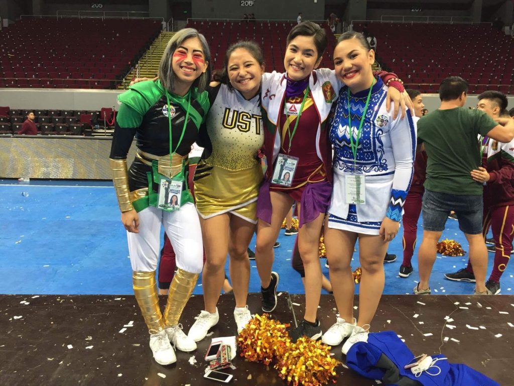 Andrada, Obispo, De Vera, and Maala recreate their high school graduation photo during the UAAP Cheerdance Competition on Dec. 3, 2017, as they fulfill their dream of being cheerleaders in De La Salle University, the University of Santo Tomas, University of the Philippines, and Ateneo de Manila University, respectively. PHOTO COURTESY OF RIKKI OBISPO