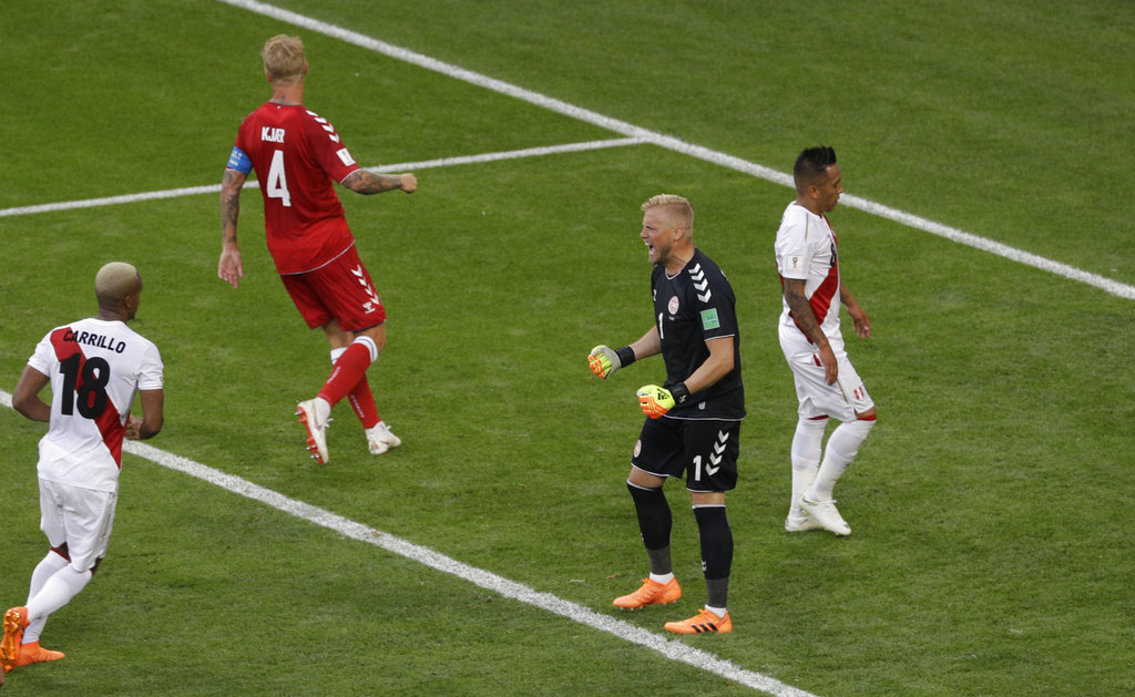 Schmeichel, Poulsen lead Denmark past Peru 1-0 at World ...