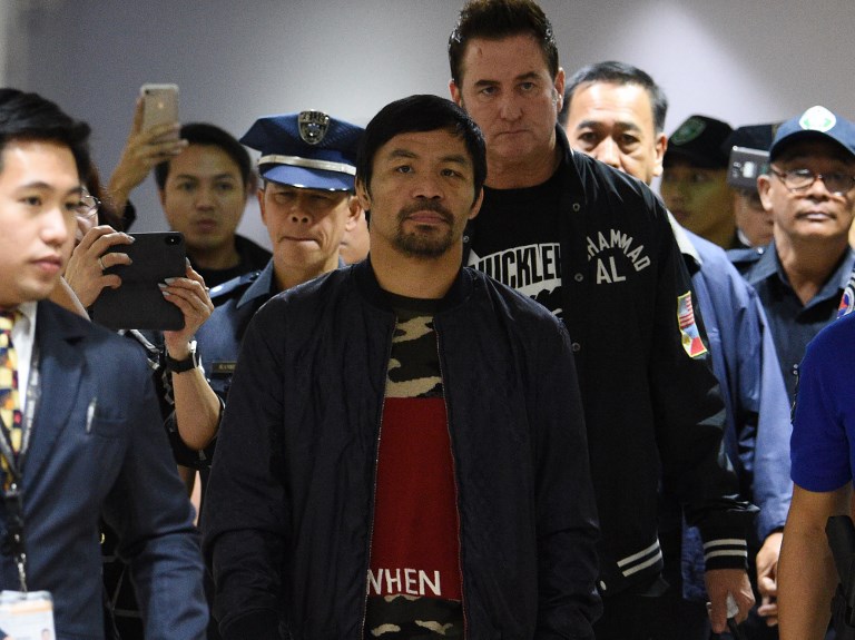 Manny Pacquiao arrives in Manila after welterweight defense