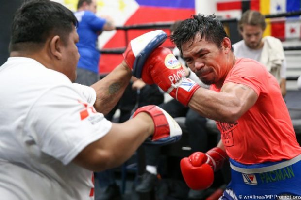 WBA WELTERWEIGHT BOUT Two days before 2019, eight-division world champion Manny Pacquiao sparred for 10 rounds at Wild Card Boxing Club in Hollywood, California—three rounds against Arnold Gonzalez, three against Lydell Rhodes and four against George Kambosos Jr. Pacquiao (60-7-2, 39 KOs) is in the most intense phase of training as he prepares for his WBA welterweight world title defense against four-division world champion Adrien “The Problem” Broner (33-3-1, 24 KOs) of Cincinnati on Jan. 19 at MGM Grand Garden Arena in Las Vegas. The 40-year-old Pacquiao’s training is being supervised by strength and conditioning coach Justin Fortune and best friend Buboy Fernandez. —BOXINGSCENE.COM/WENDELL ALINEA-MP PROMOTIONS