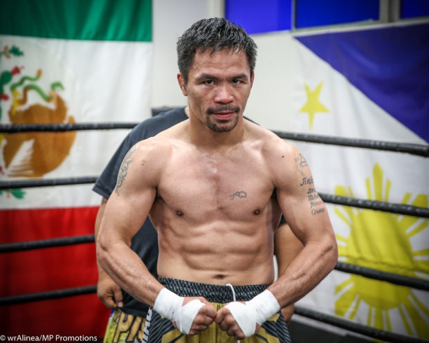 Pacquiao: No plans yet of retiring from boxing; 'still happy doing it'