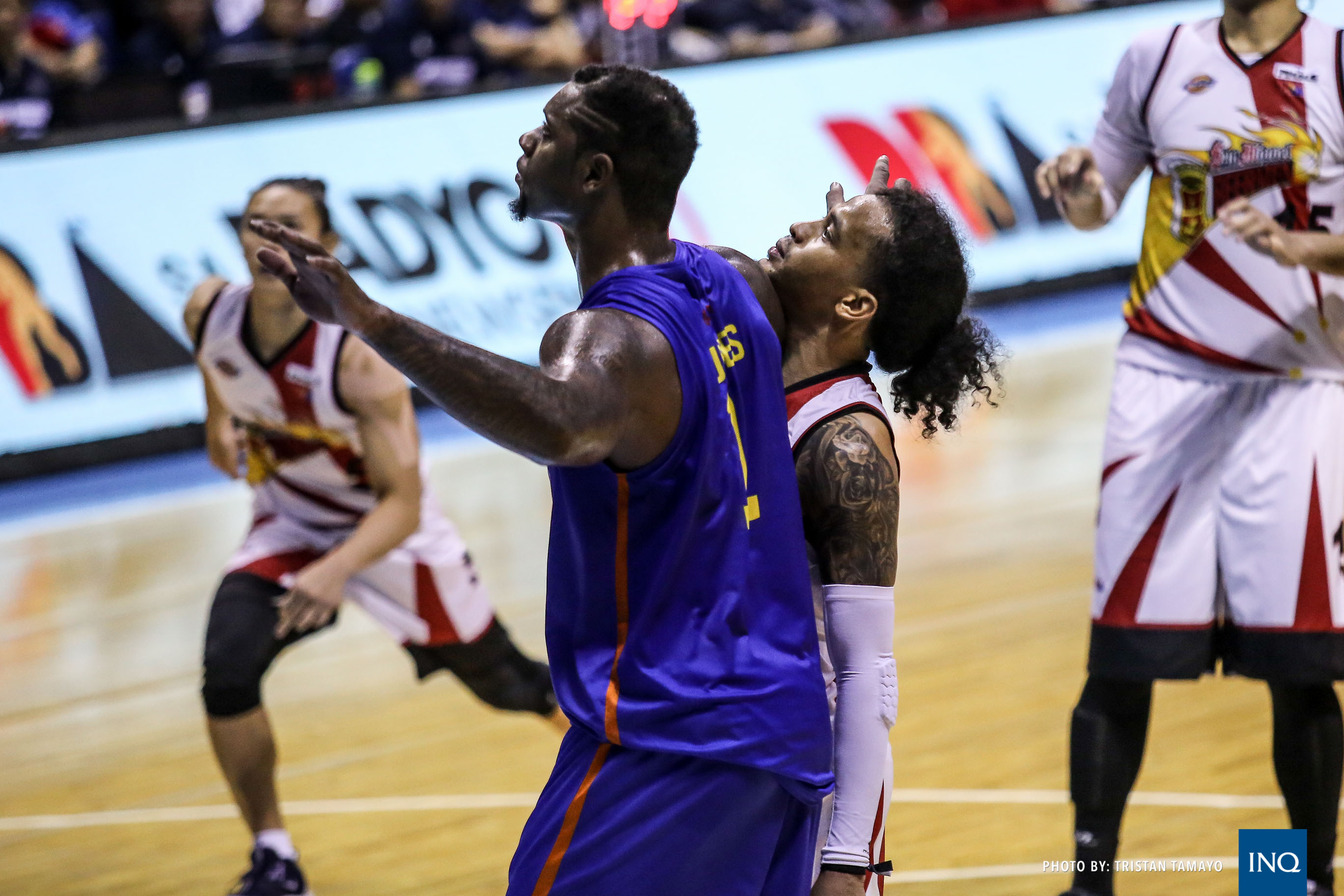 FILE - One of the heated moments between San Miguel guard Chris Ross and TNT import Terrence Jones. Photo by Tristan Tamayo/INQUIRER.net