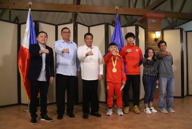 Duterte gives P1M to Carlos Yulo, Nesthy Petecio