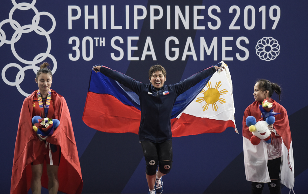 DECEMBER 2, 2019: Philippines' Hidilyn Diaz celebrates her gold medal finish at the 55kg weightlifting at the 30th SEA Games 2019.  