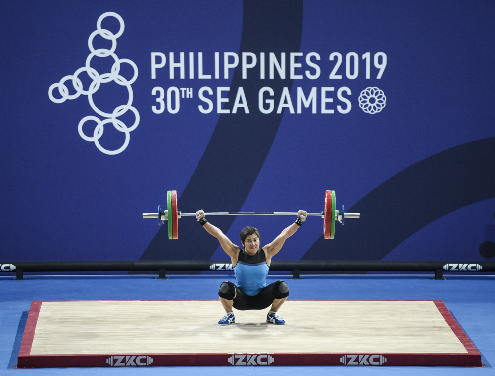 DECEMBER 2, 2019: Philippines' Hidilyn Diaz competes in the women's snatch 55kg weightlifting at the 30th SEA Games 2019.