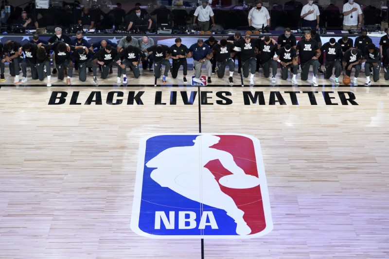 NBA players protest racial injustice as league returns to action ...