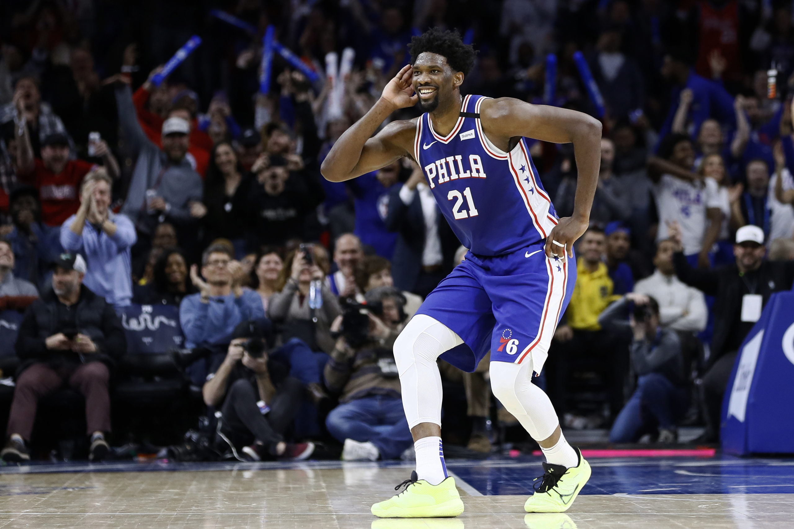 In this Feb. 24, 2020, file photo, Philadelphia 76ers' Joel Embiid celebrates after a three-point basket during the second half of an NBA basketball game against the Atlanta Hawks in Philadelphia.