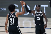 Minus stars, Nets clinch playoff spot in victory over Kings