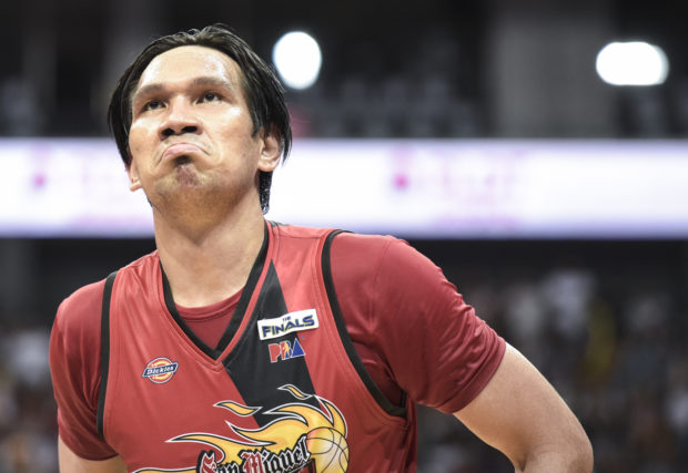 San Miguel's June Mar Fajardo gestures after a play against Ginebra