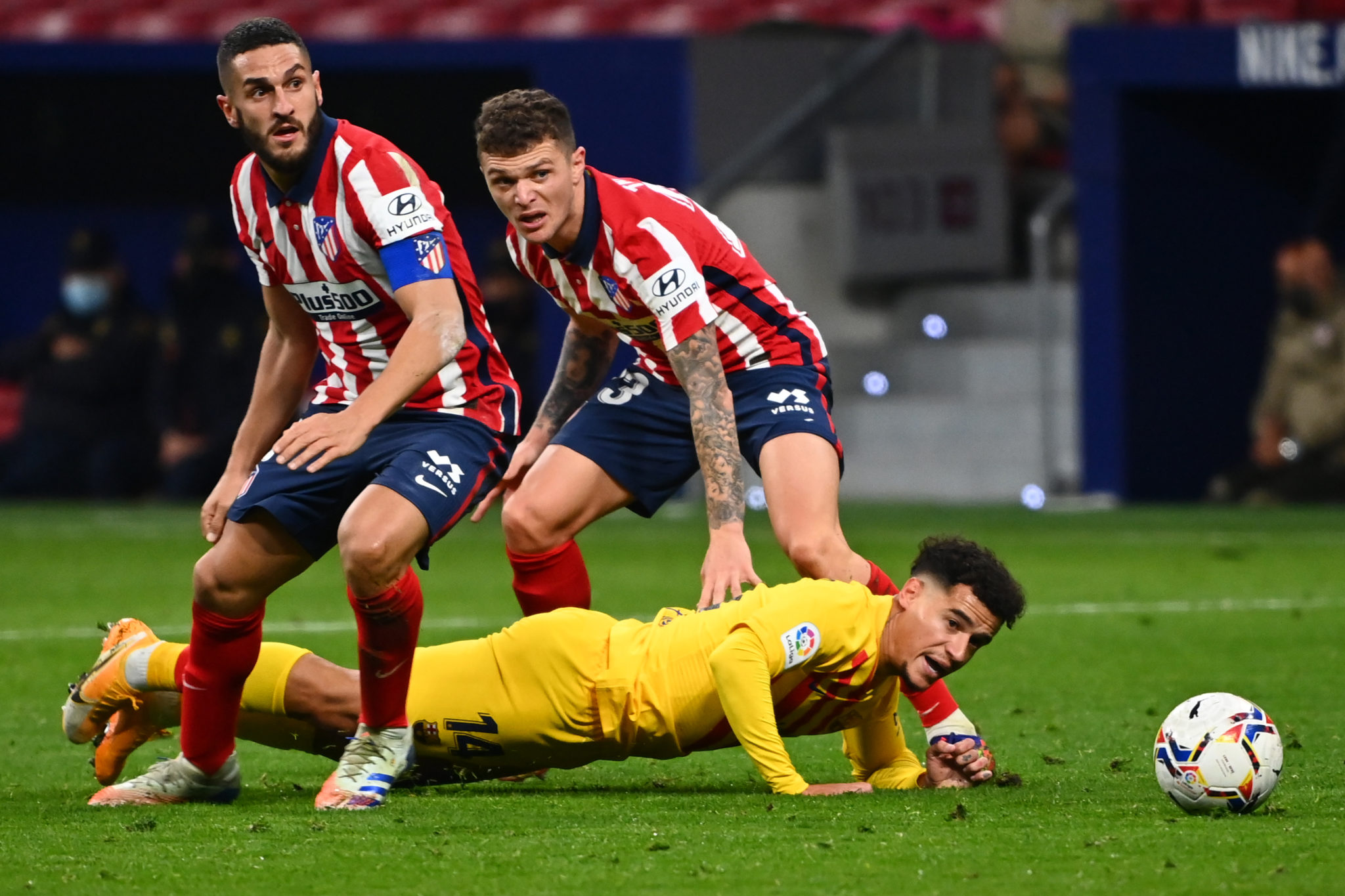 Atletico edge past Barca to earn title boost as Real Madrid held