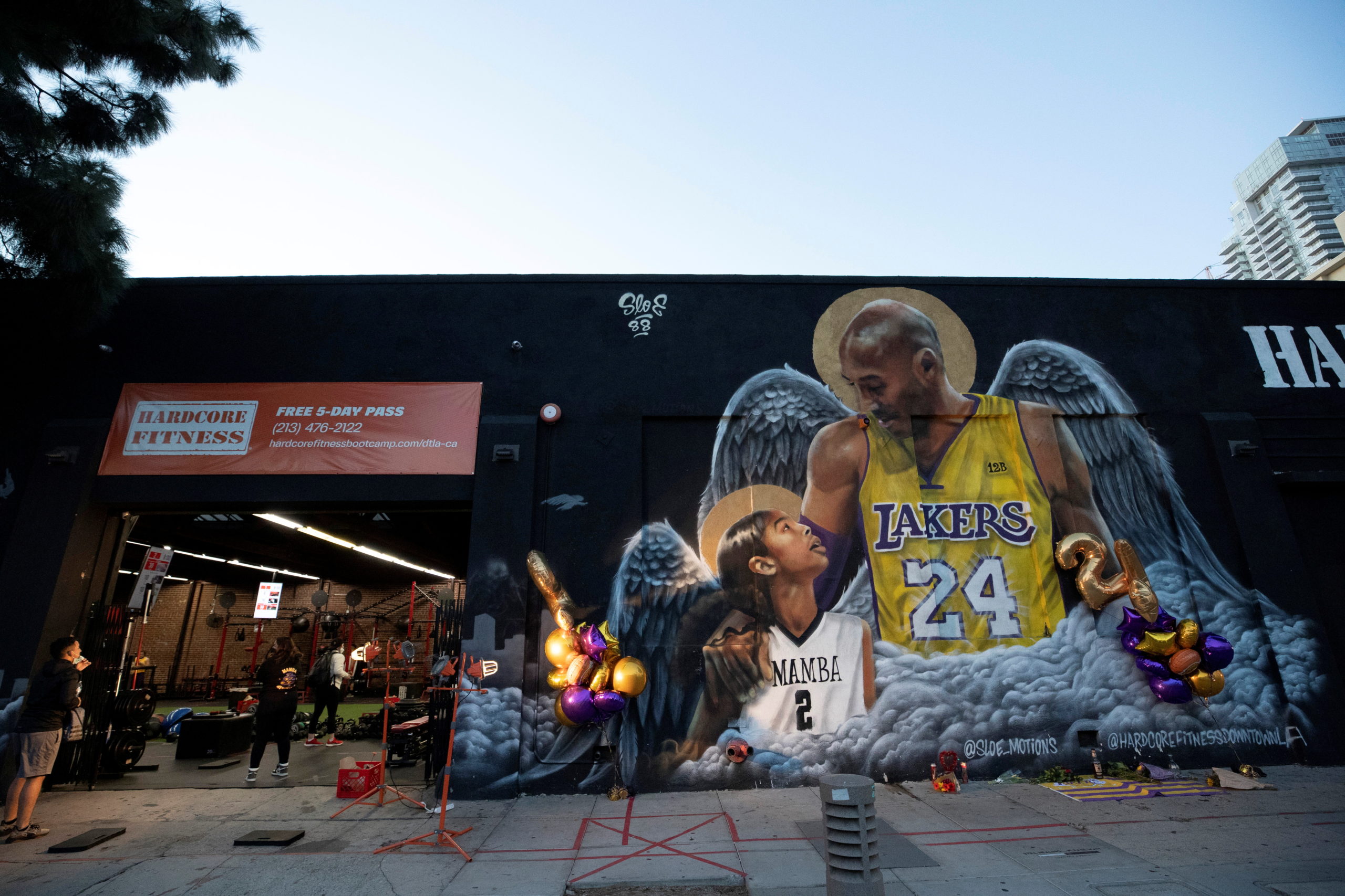 FILE PHOTO: A mural of late Kobe Bryant, who perished one year ago alongside his daughter and seven others when their helicopter crashed into a hillside, next to a gym in Los Angeles, California, U.S., January 26, 2021.