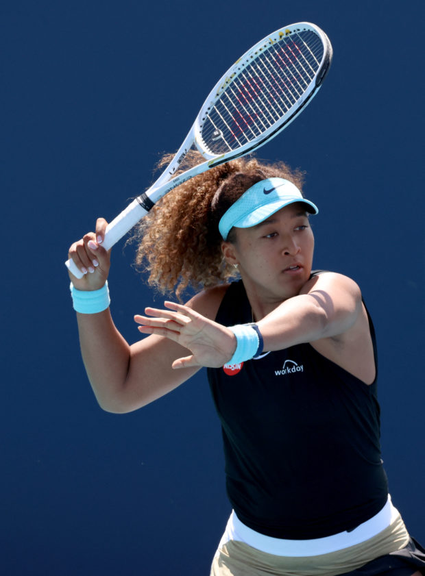 Naomi Osaka of Japan returns a shot during her singles second round match against Ajla Tomljanovi? of Australia on Day 5 of the 2021 Miami Open presented by Itaú at Hard Rock Stadium on March 26, 2021 in Miami Gardens, Florida. Mark Brown/Getty Images/AFP (Photo by Mark Brown / GETTY IMAGES NORTH AMERICA / Getty Images via AFP)