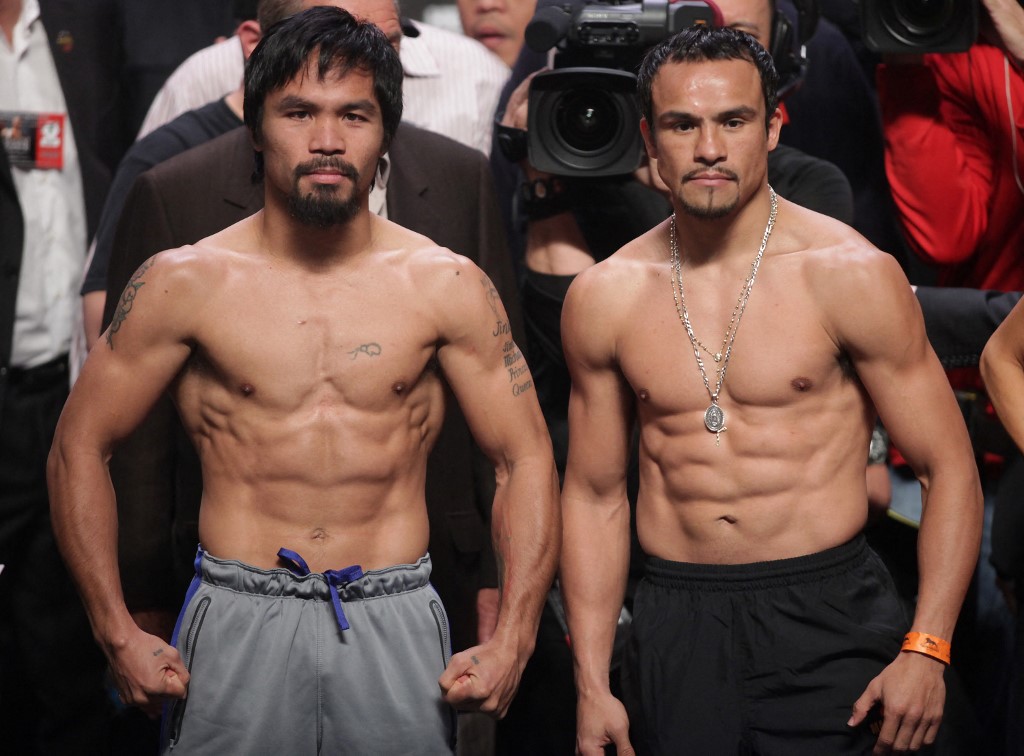 Manny Pacquiao (L) of the Philippines and Juan Manuel Marquez 