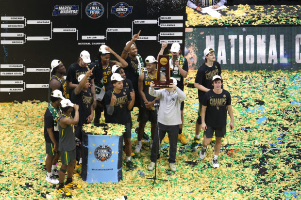 Head coach Scott Drew of the Baylor Bears holds up the trophy after defeating the Gonzaga Bulldogs 86-70 in the National Championship game of the 2021 NCAA Men's Basketball Tournament at Lucas Oil Stadium on April 05, 2021 in Indianapolis, Indiana. 