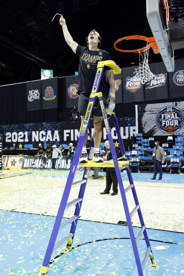 Mark Paterson #35 of the Baylor Bears cuts the net after defeating the Gonzaga Bulldogs 86-70 in the National Championship game of the 2021 NCAA Men's Basketball Tournament at Lucas Oil Stadium on April 05, 2021 in Indianapolis, Indiana. 