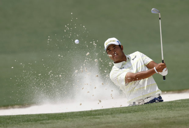Japan's Hideki Matsuyama plays out of a bunker on the 2nd hole during the final round REUTERS/Mike Segar