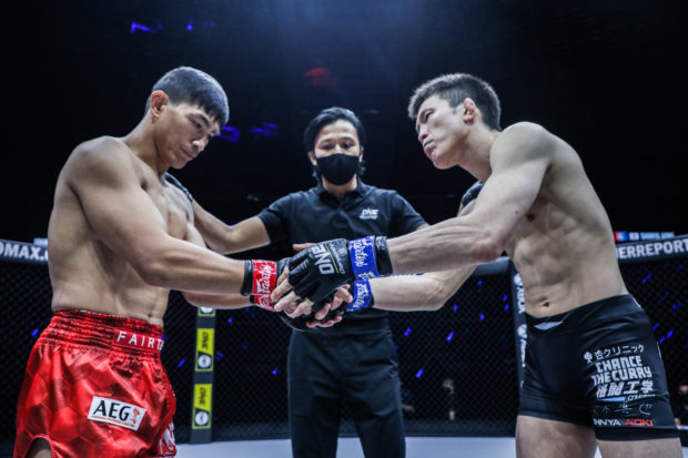 Eduard Folayang and Shinya Aoki shake hands ahead of their ONE lightweight bout. ONE CHAMPIONSHIP PHOTO