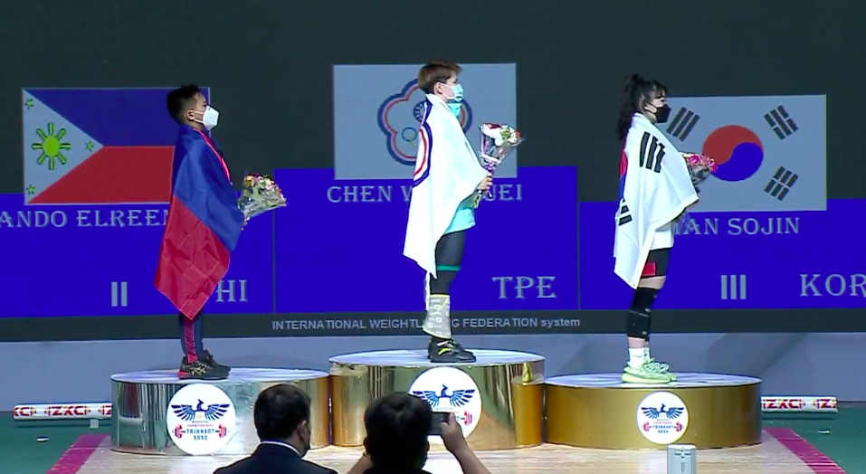 Filipino weightlifter Erleen Ando on the podium for the women's 64kg division at the Asian Weightlifting Championships. 