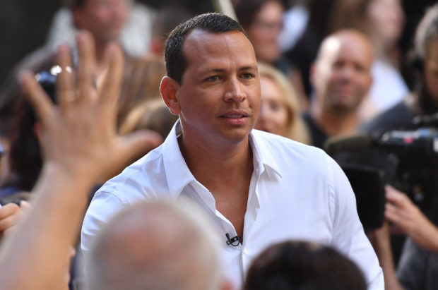 US former professional baseball player Alex Rodriguez greets fans after Keith Urban performs on NBC's 'Today Show' at Rockefeller Plaza in New York City. - Retired Major League Baseball star Alex Rodriguez and businessman Marc Lore have reached a deal to buy the NBA's Minnesota Timberwolves, the team announced May 14. The agreement, which must be approved by the NBA board of governors, also includes the purchase of the Women's NBA's Minnesota Lynx. (Photo by ANGELA WEISS / AFP)