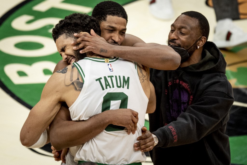  Tristan Thompson #13 of the Boston Celtics celebrates with Jayson Tatum 