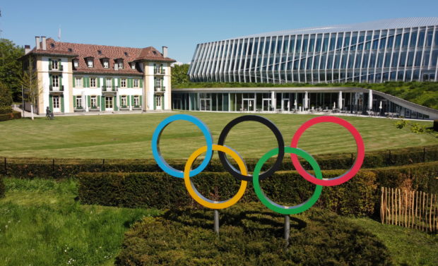 The Olympic rings are pictured in front of the International Olympic Committee (IOC) headquarters in Lausanne, Switzerland, May 3, 2021. Picture taken with a drone. REUTERS/Denis Balibouse