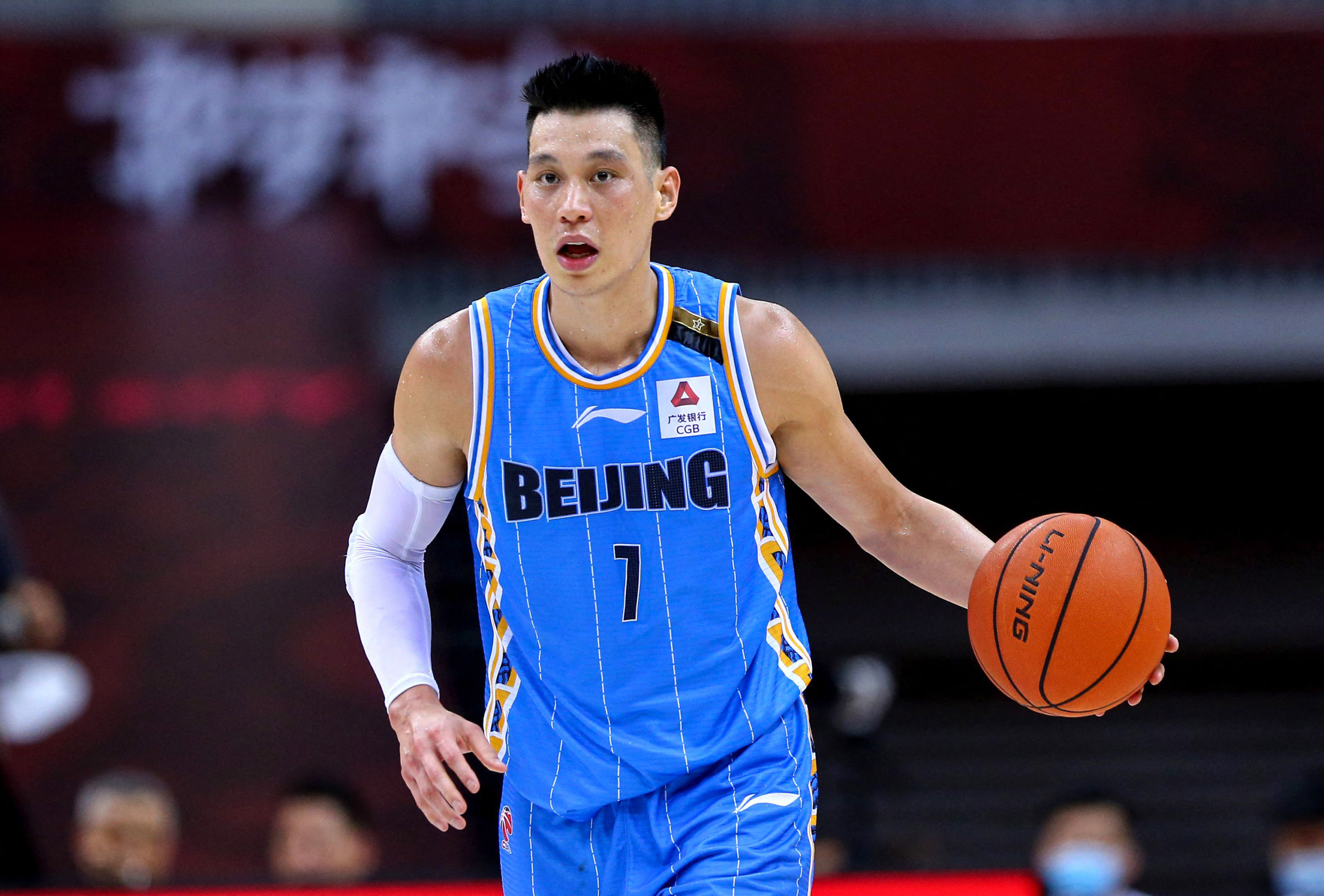 Beijing Ducks' Jeremy Lin driving the ball during the Chinese Basketball