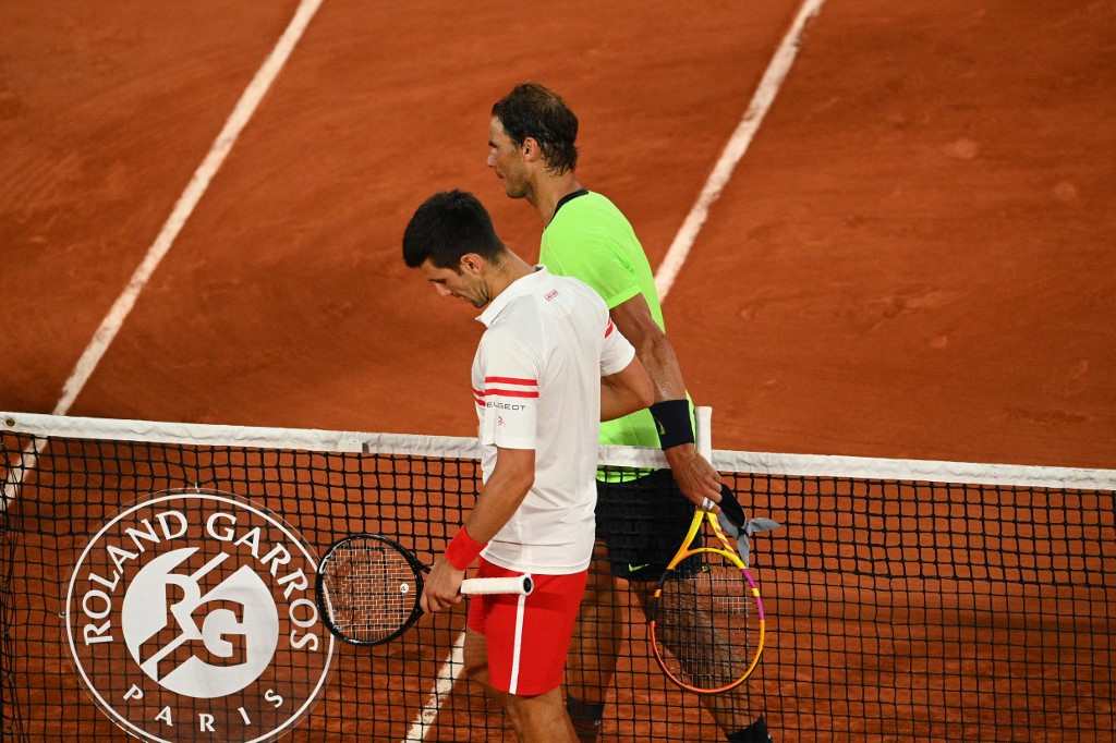 Serbia's Novak Djokovic (L) and Spain's Rafael Nadal shake hands  french open