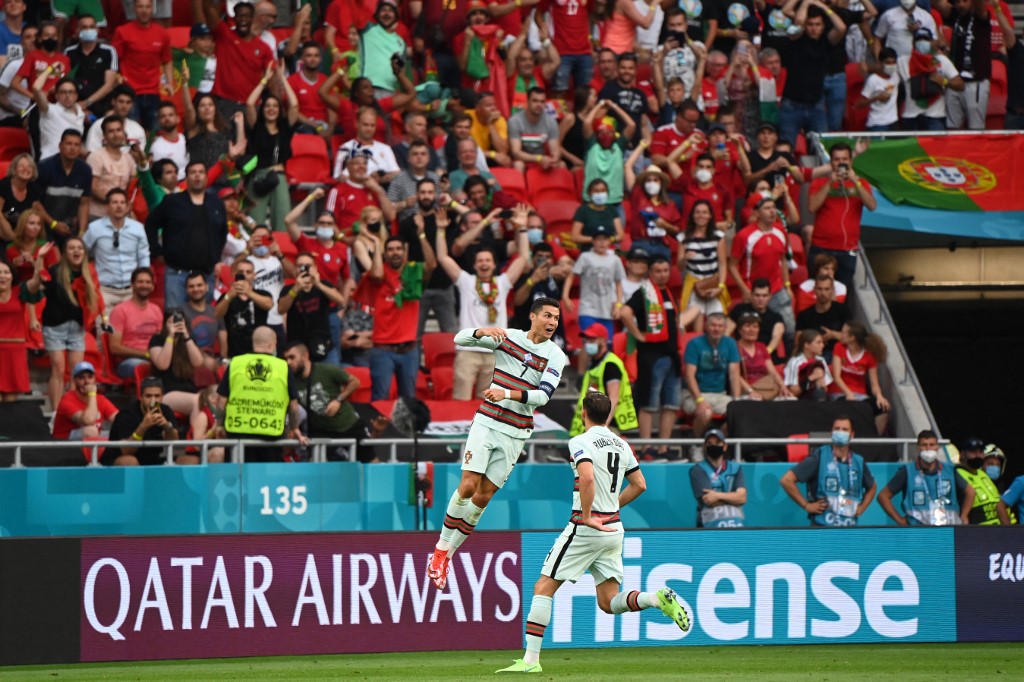 Portugal's forward Cristiano Ronaldo celebrates scoring his team's third goal during the UEFA EURO 2020