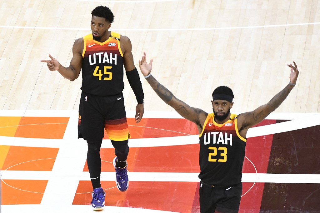 Donovan Mitchell #45 and Royce O'Neale #23 of the Utah Jazz 
