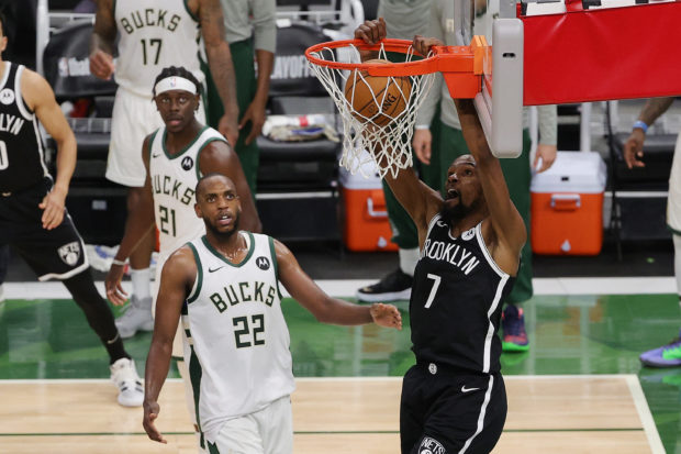  Kevin Durant #7 of the Brooklyn Nets dunks against the Milwaukee Bucks during the second half of Game Four of the Eastern Conference second round playoff series at the Fiserv Forum on June 13, 2021 in Milwaukee, Wisconsin. NOTE TO USER: User expressly acknowledges and agrees that, by downloading and or using this photograph, User is consenting to the terms and conditions of the Getty Images License Agreement. Stacy Revere/Getty Images/AFP (Photo by Stacy Revere / GETTY IMAGES NORTH AMERICA / Getty Images via AFP)