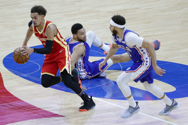 Trae Young #11 of the Atlanta Hawks gets a steal during the third quarter against the Philadelphia 76ers during Game Five of the Eastern Conference Semifinals at Wells Fargo Center on June 16, 2021 in Philadelphia, Pennsylvania. NOTE TO USER: User expressly acknowledges and agrees that, by downloading and or using this photograph, User is consenting to the terms and conditions of the Getty Images License Agreement.   Tim Nwachukwu/Getty Images/AFP (Photo by Tim Nwachukwu / GETTY IMAGES NORTH AMERICA / Getty Images via AFP)