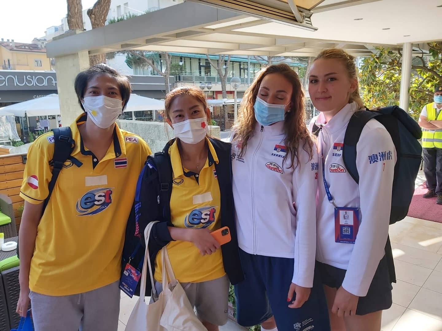 Serbian volleyball team members with Thai national team players