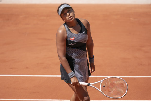 Naomi Osaka (JPN) reacts during her match against Patricia Maria Tig (ROU) at Roland Garros Stadium. Mandatory Credit: Susan Mullane-USA TODAY Sports