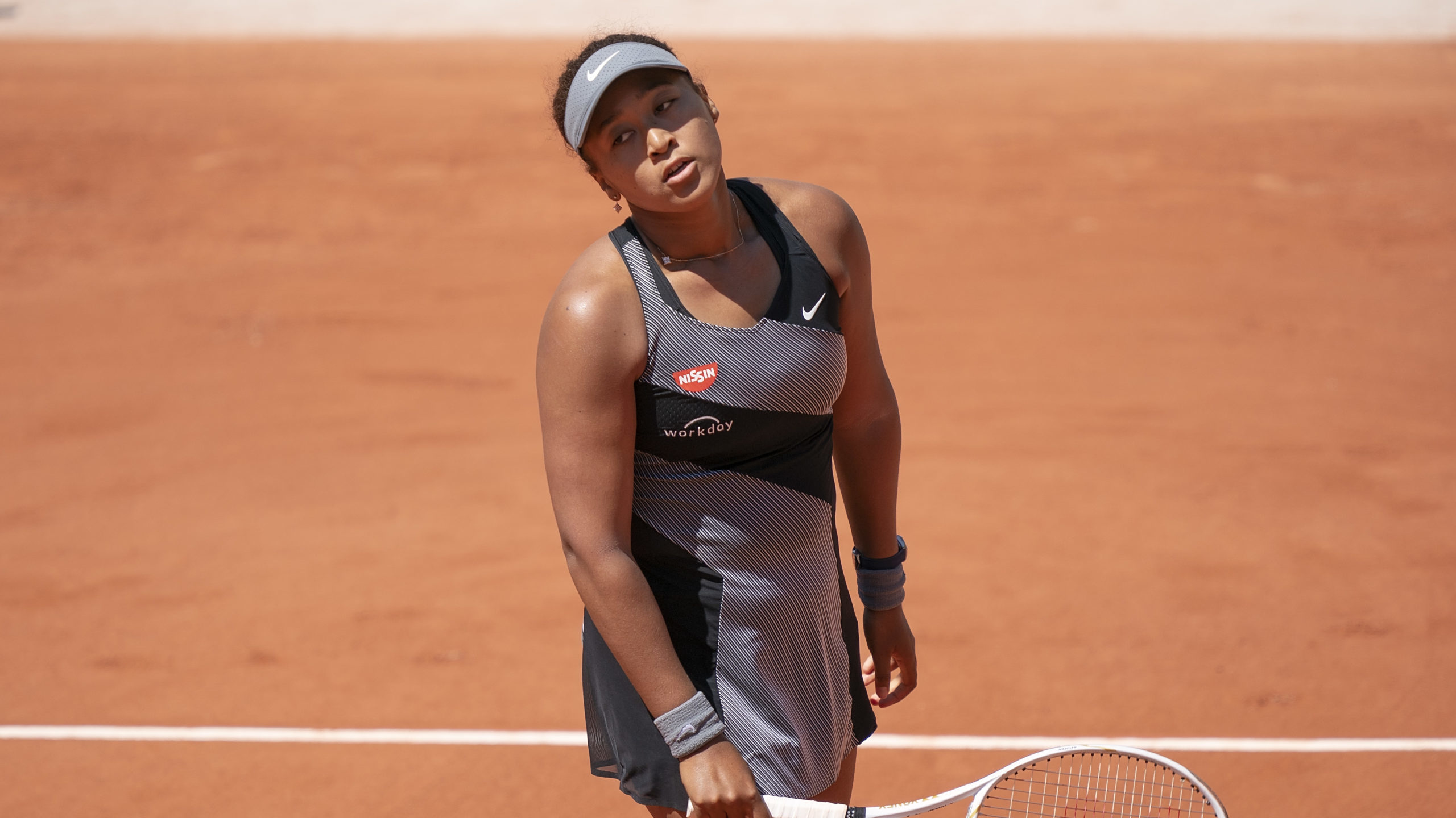 Naomi Osaka (JPN) reacts during her match against Patricia Maria Tig (ROU) at Roland Garros Stadium. Mandatory Credit: Susan Mullane-USA TODAY Sports