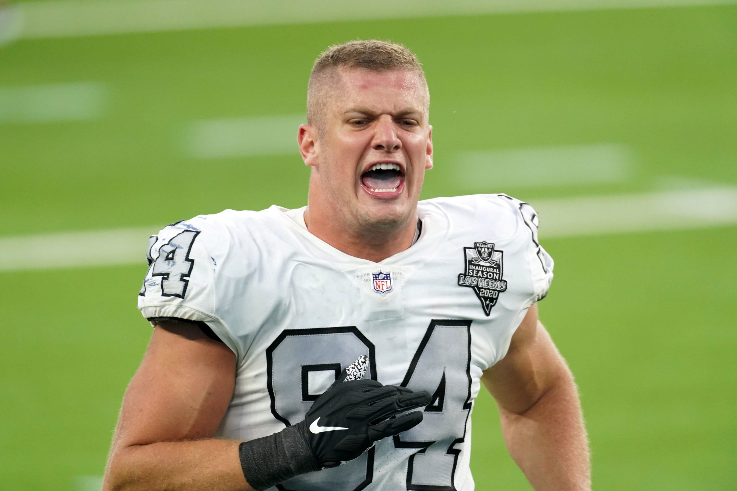 : Las Vegas Raiders defensive end Carl Nassib celebrates at the end of the game against the Los Angeles Chargers