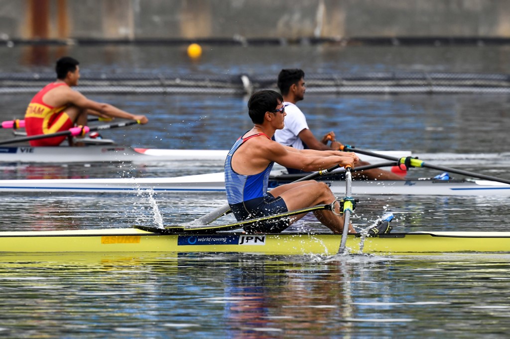 Japan's Ryuta Arakawa (front) competes during the men's single sculls semi-finals of the 2021 World Rowing Asia-Oceania Olympic and Paralympic Continental Qualifying Regatta in Tokyo on May 7, 2021, at the Sea Forest Waterway, where the Olympic and Paralympic Games events will be held.