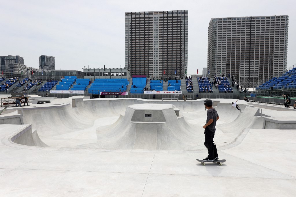 A Japanese skater stands next to the park skateboarding venue during a test event for Tokyo 2020 Olympic Games at the Ariake Urban Sports Park in Tokyo on May 14, 2021.