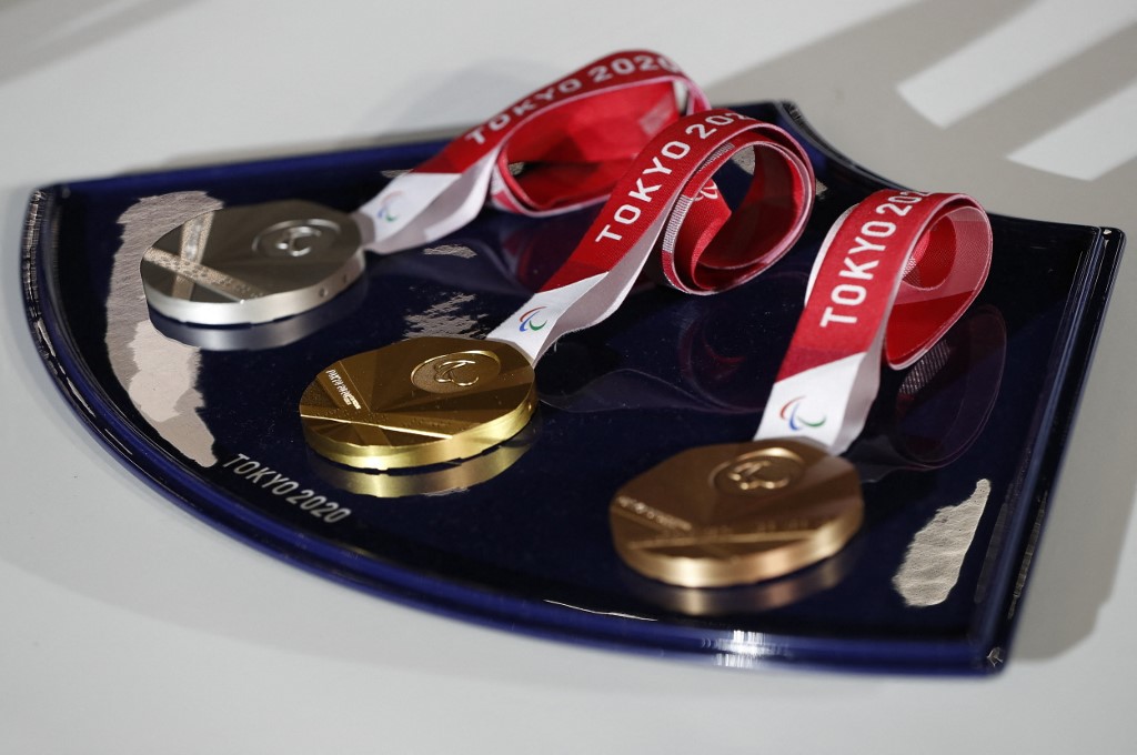 The medals and tray to be used for the medal ceremonies at the Tokyo 2020 Olympics Games are seen during an event to mark 50 days to the opening ceremony, at Ariake Arena in Tokyo on June 3, 2021.